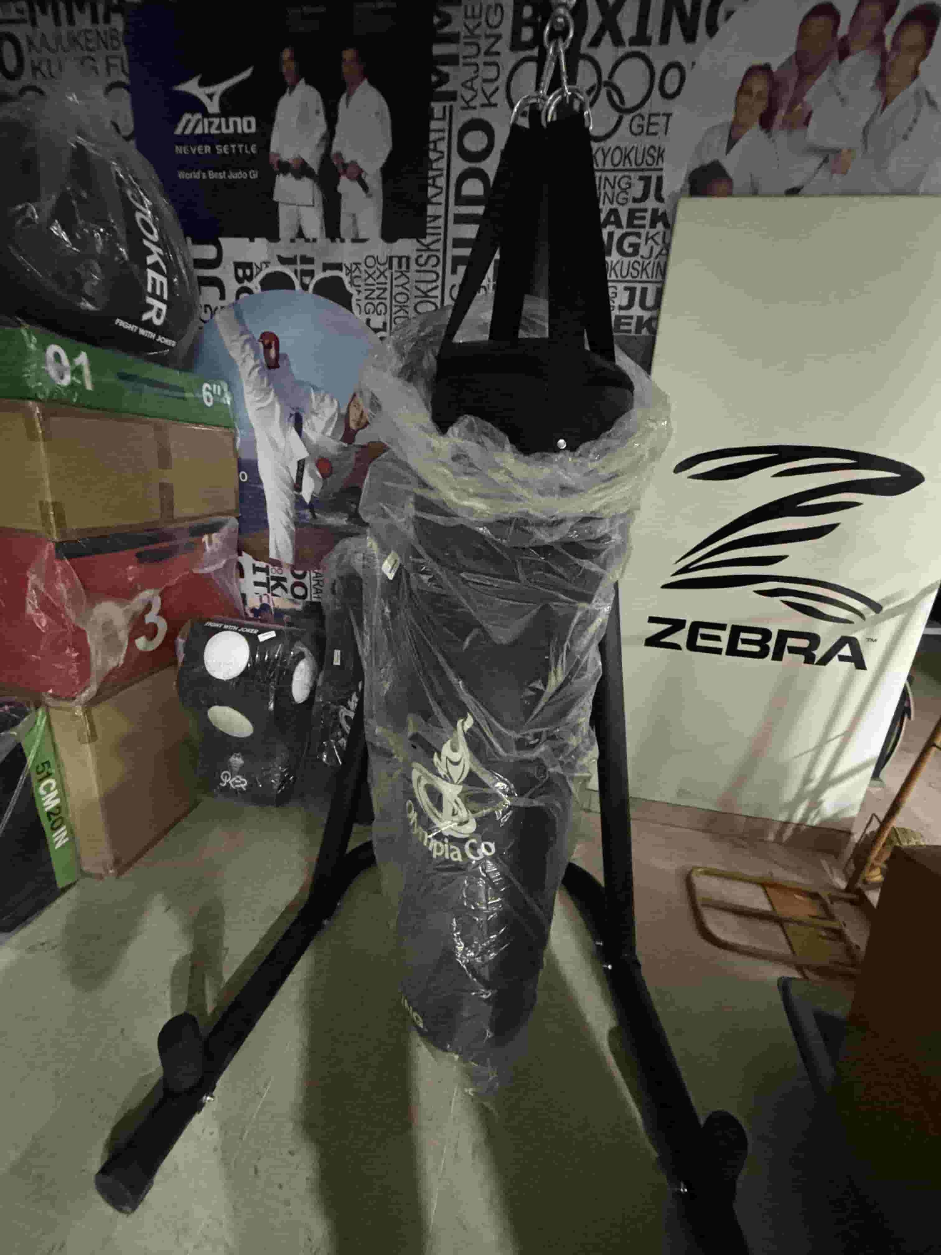 For sale a new boxing bag with a stand