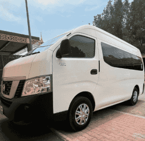 Nissan passenger bus for sale with a high roof