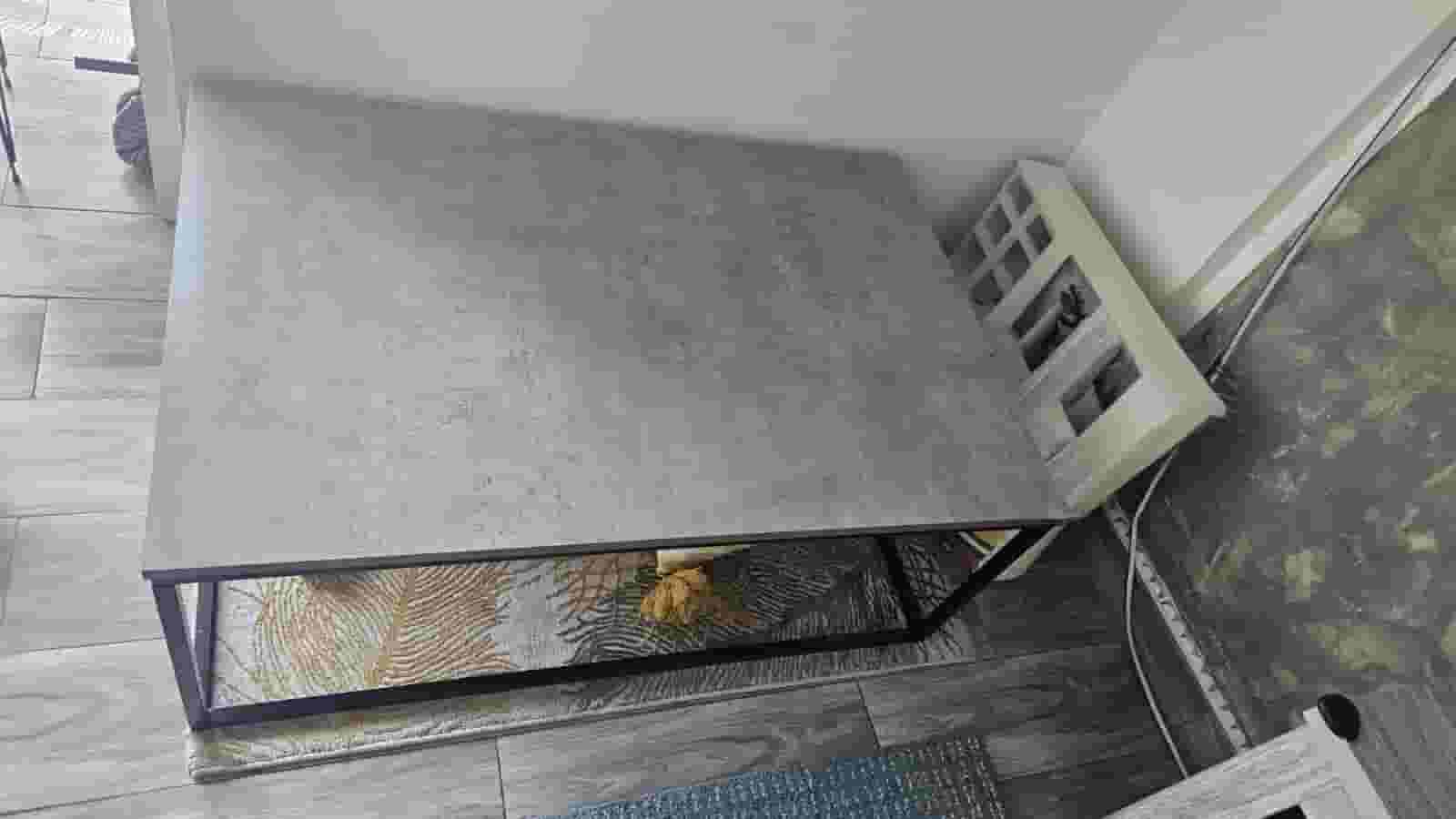 Modern mid-size coffee table in gray, black concrete