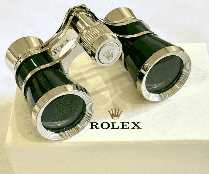 Rolex derbell and binoculars