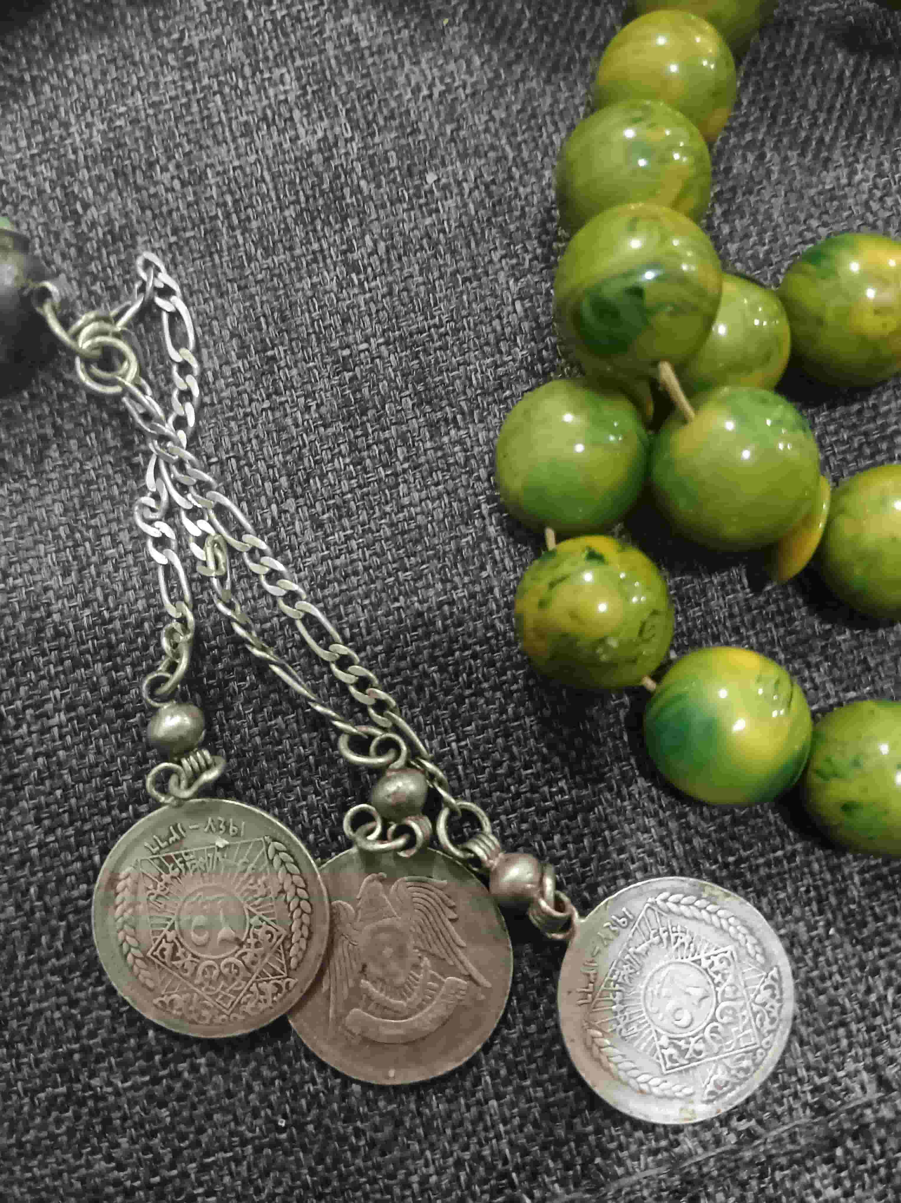 Maskawi cooking pool with a three quarter Syrian pound silver drink
