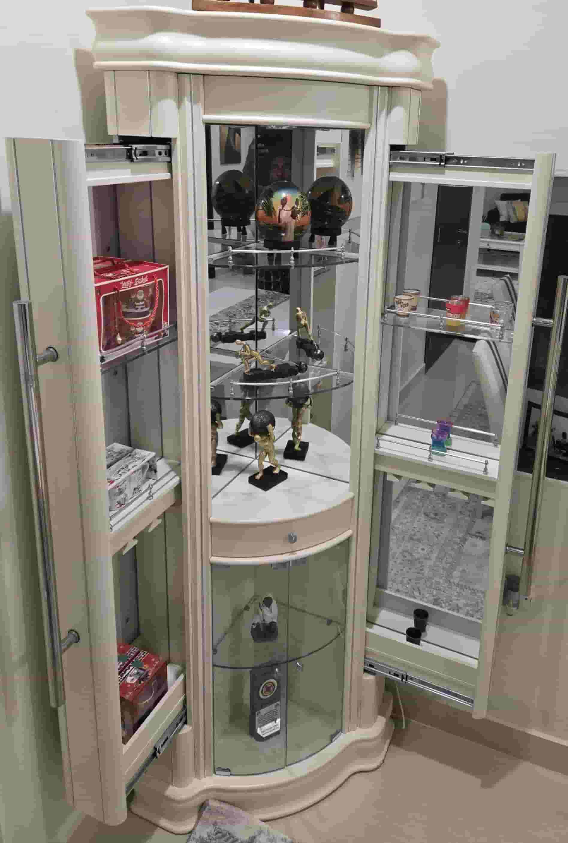 The charming corner antique cabinet