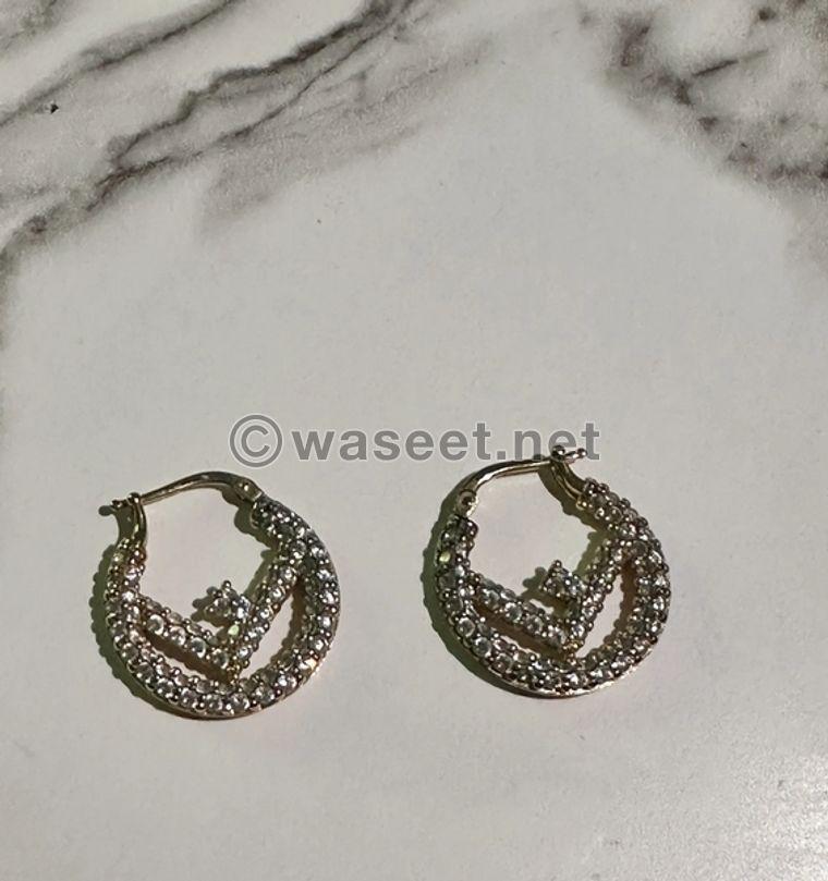 Fendi gold earrings with stones 0