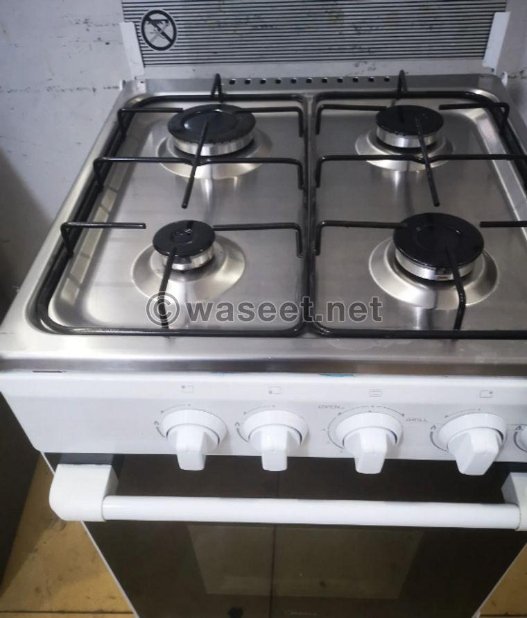 Four-burner stove, oven and grill size 50 0