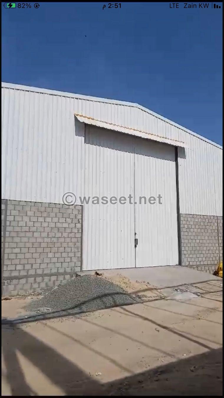 For rent a 5000 m warehouse in Mina Abdullah, fire station, electricity and municipality are licensed  0