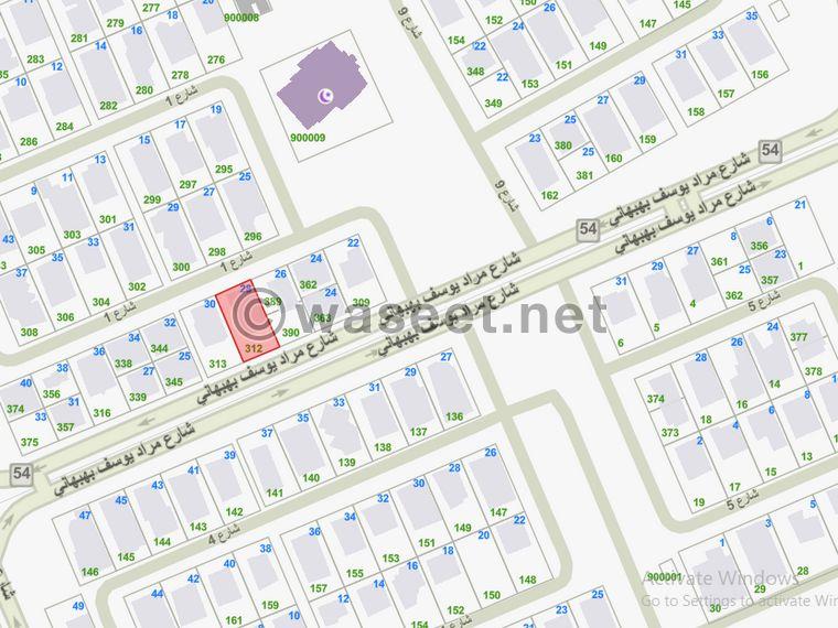 Land for sale in Mushrif, one main street  0