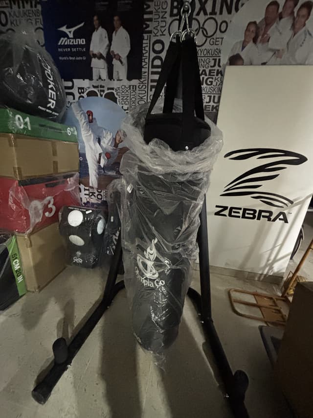 For sale a new boxing bag with a stand