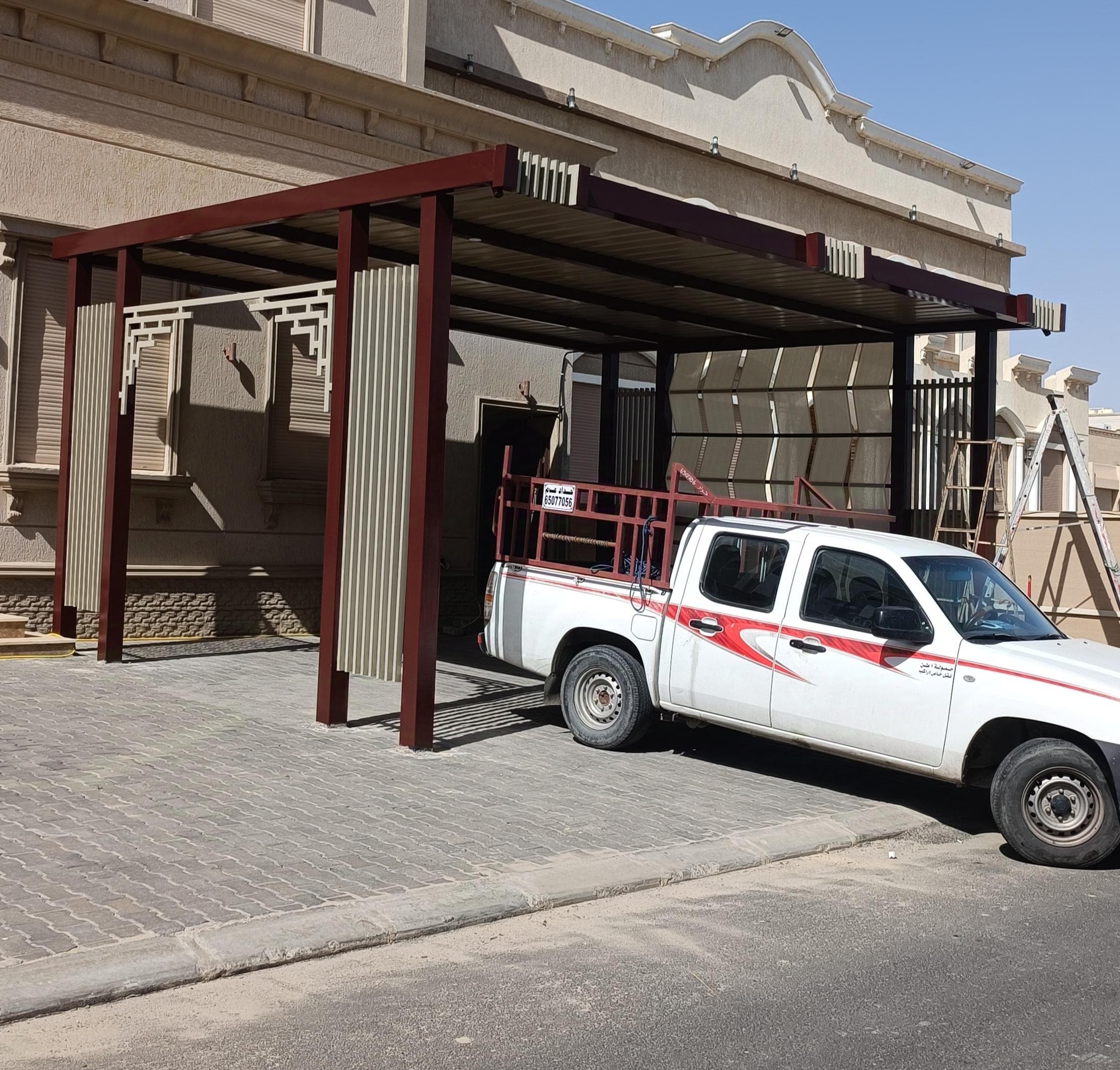 حداد جميع انواع مظلات ديوانيات  0
