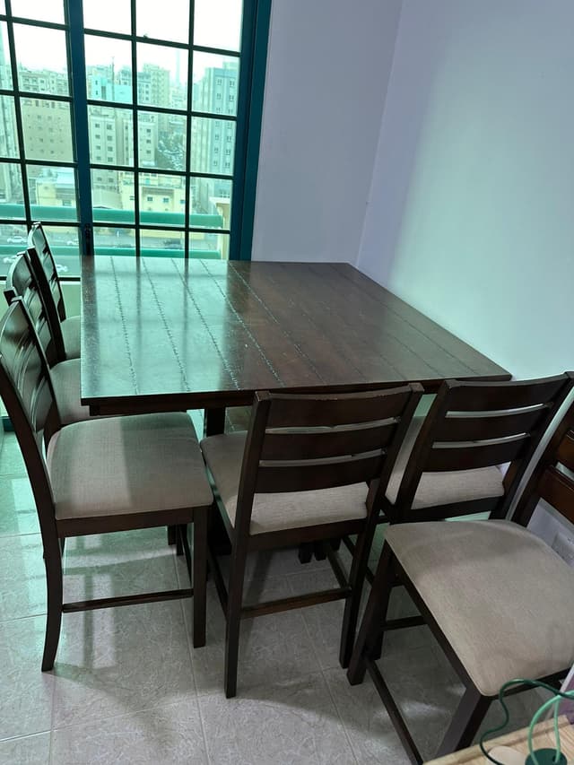 For sale for travel, a dining table with 6 chairs 