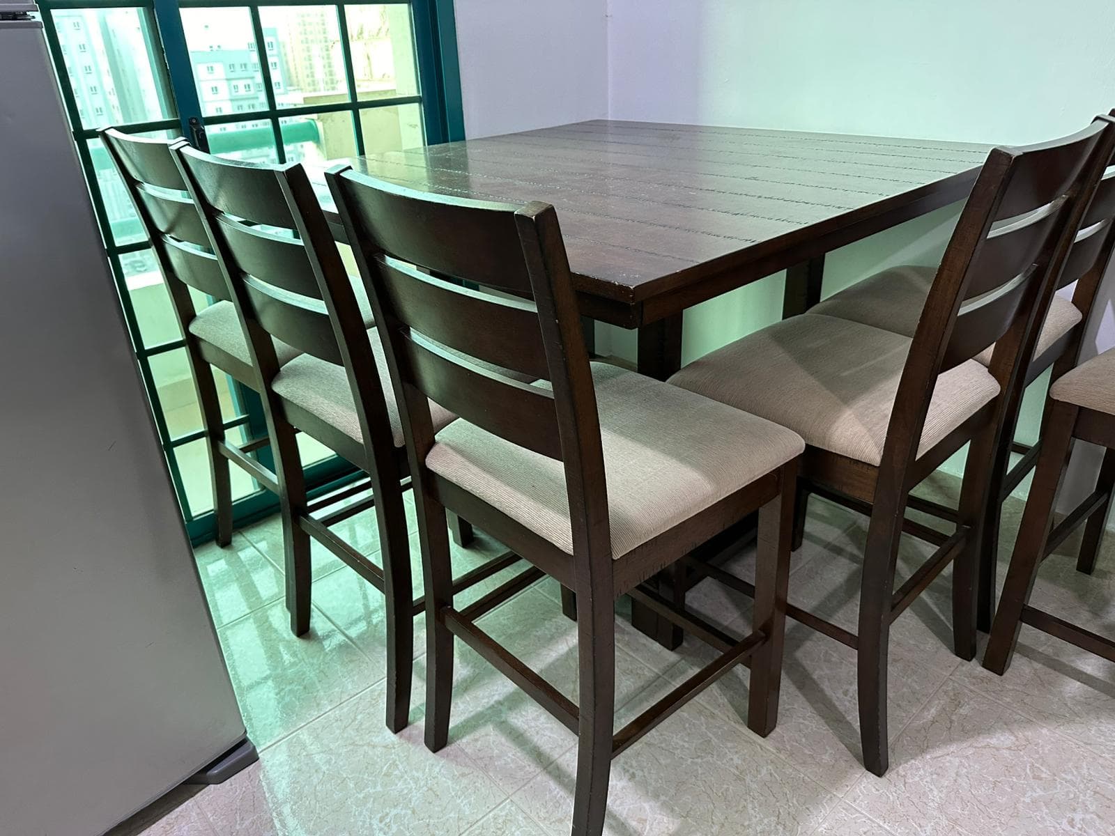 For sale for travel, a dining table with 6 chairs  0