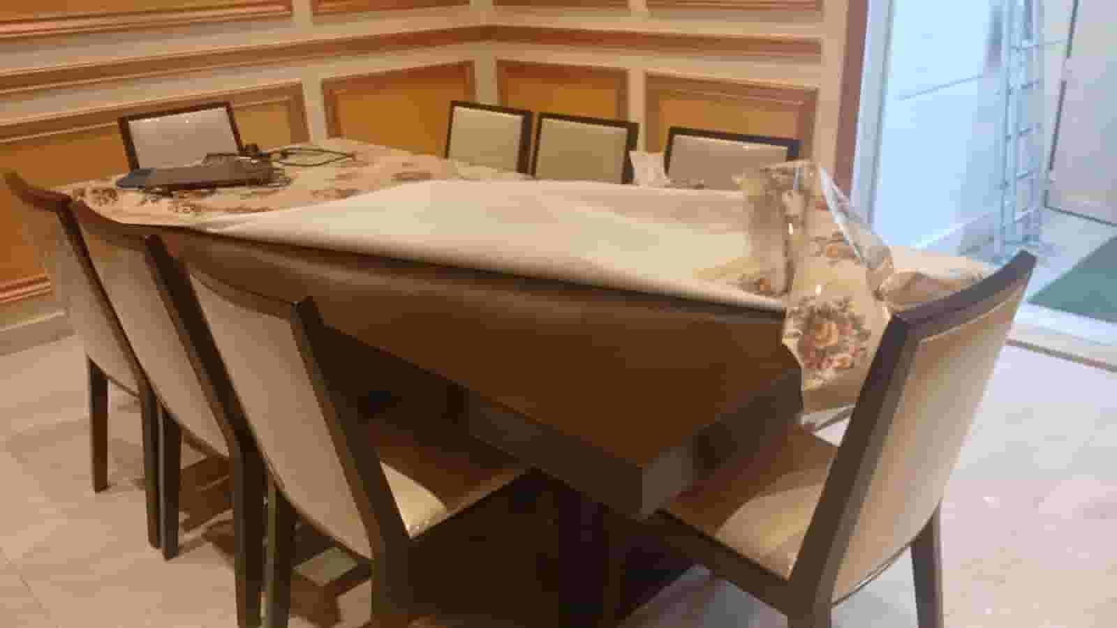 A table with 8 chairs in excellent condition A table with 8 chairs in excellent condition